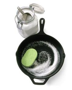 * For us Southern girls who grew up being told to NEVER EVER wash your cast irons with soap...scrub your cast iron with coarse salt and a soft sponge. The salt is a natural abrasive and will absorb oil and lift away bits of food while preserving the pan's seasoning. Rinse away salt and wipe dry. FINALLY!!!!